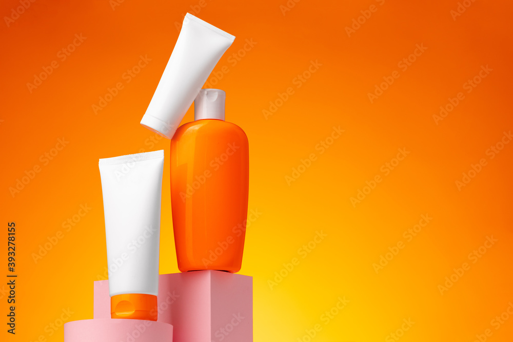 Skincare beauty products container against pink background Skincare beauty products container against pink background
