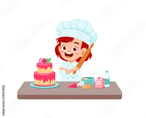 happy cute little kid boy and girl wear chef uniform and cooking a birthday cake