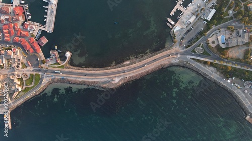 Small island yacht port near connecting road