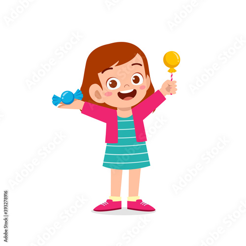 happy cute little kid boy and girl eat candy and sweets