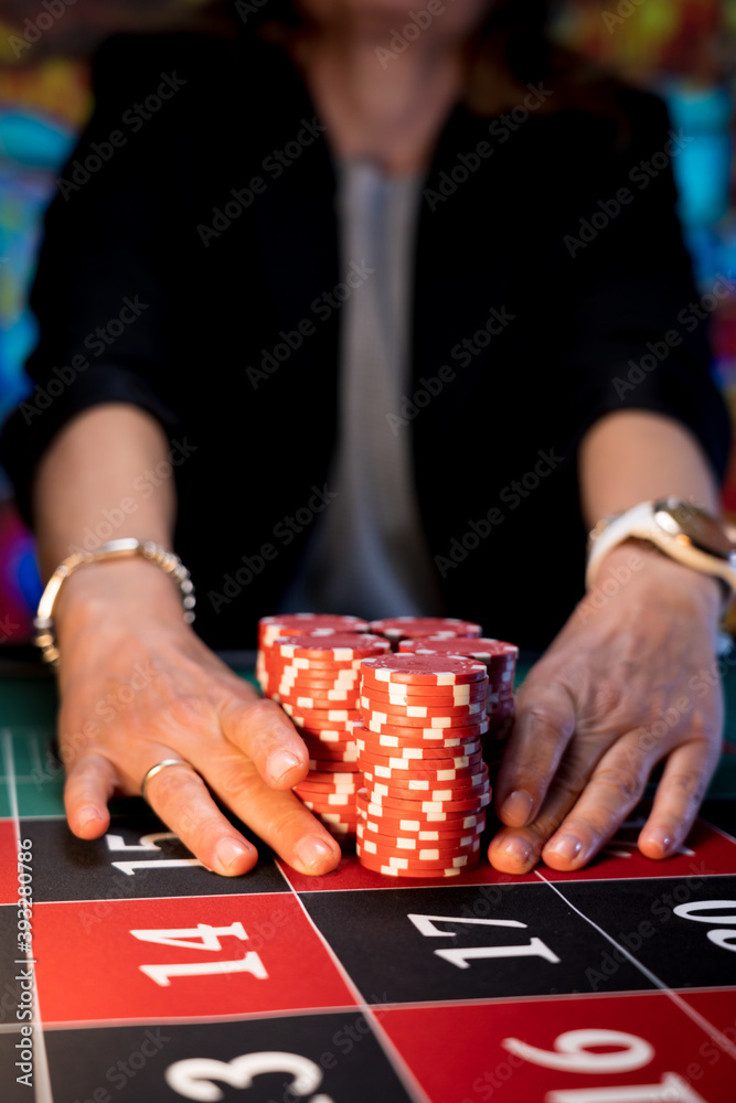 Woman playing at the roulette table Woman playing at the roulette table