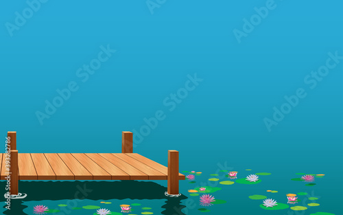 landscape of wooden bridge on the lotus swamp in daytime