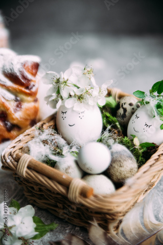 Beautiful Easter white eggs. Easter table decor © elenavah
