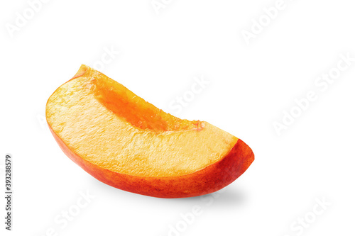 Slice of ripe juicy nectarine on a white background. Copy space