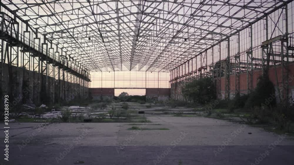 Walking inside an abandoned warehouse at sunset - Point of view golden hour Walking inside an abandoned warehouse at sunset - Point of view golden hour