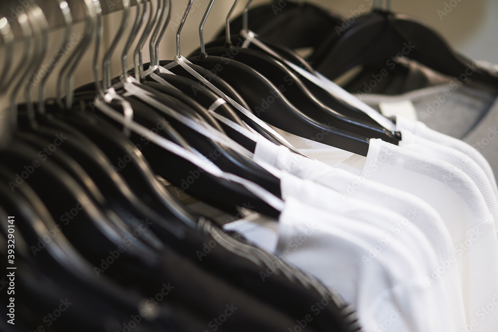 clothes hanger in the store Large selection of clothing clothes hanger in the store Large selection of clothing
