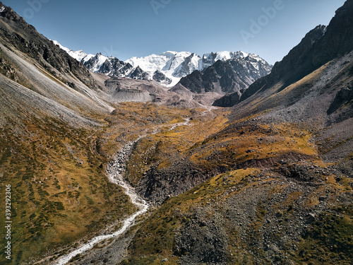 Aerial view of mountain landscape with river in central Asia