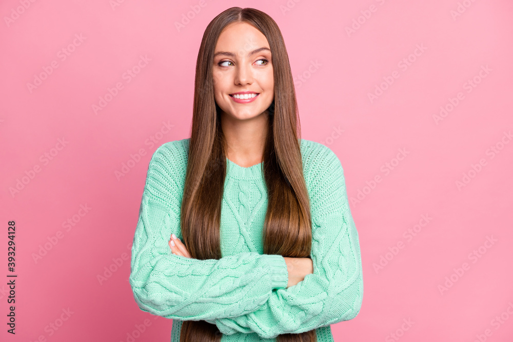 Photo of friendly person folded arms look empty space teal sweater outfit isolated on pink color background Photo of friendly person folded arms look empty space teal sweater outfit isolated on pink color background