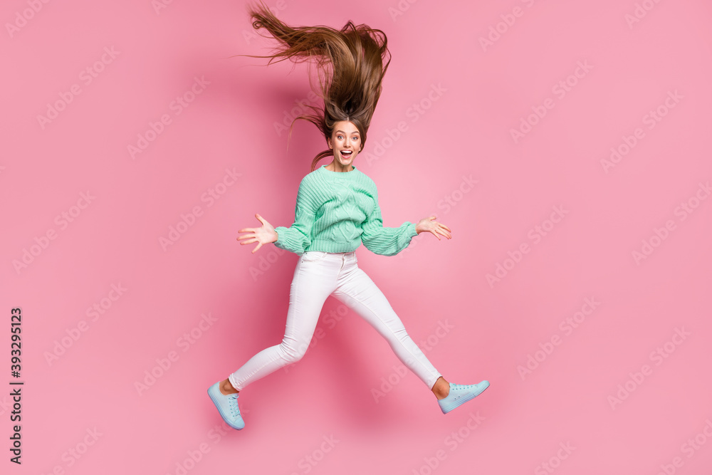 Full length photo of cool carefree person hair fly up palms open mouth isolated on pink color background Full length photo of cool carefree person hair fly up palms open mouth isolated on pink color background