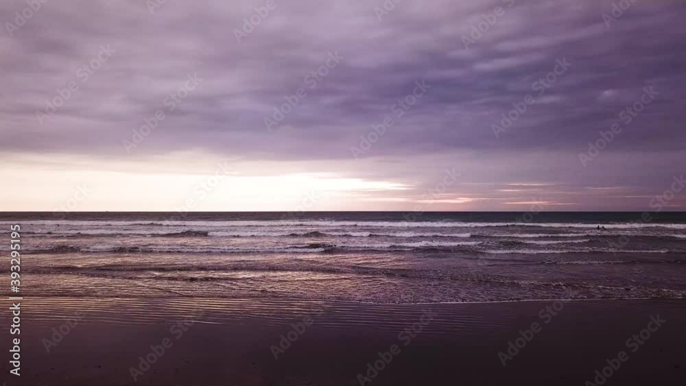 People enjoying a sunset walk along Olon Beach, Ecuador -aerial People enjoying a sunset walk along Olon Beach, Ecuador -aerial