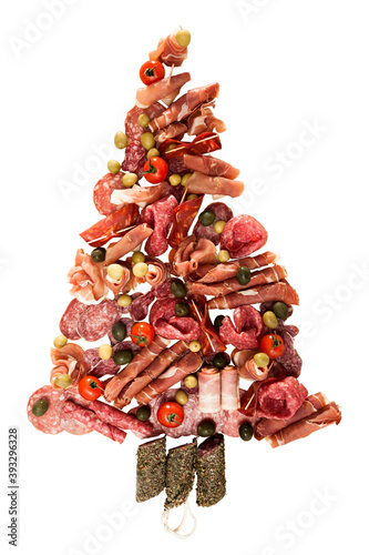 Christmas tree made of sausage on a background of a wooden wall