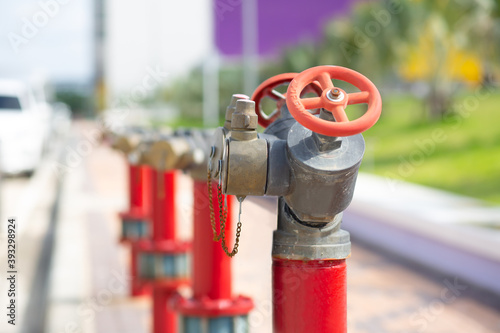 Quadro su tela Fire hydrant with angle valve install at sidewalk.