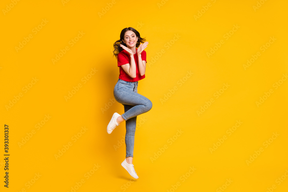 Full size photo of cheerful attractive girl jump wear sneakers isolated over vivid color background