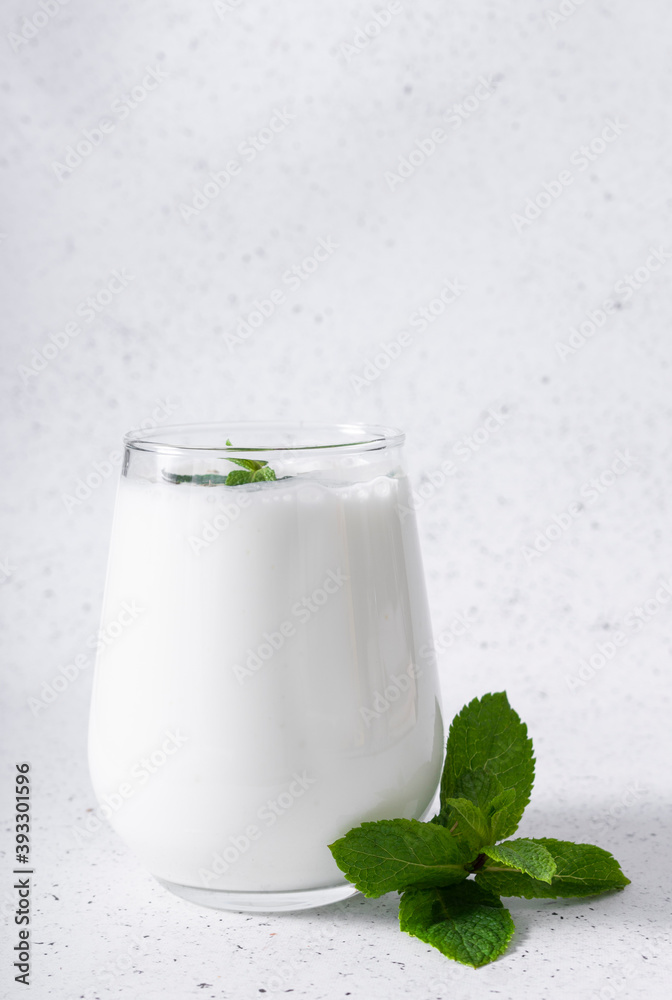 Indian cold drink salty Lassi. It is prepared on the basis of yogurt with the addition of water, salt, sugar, spices, fruit and ice by rapid whipping. Indian cold drink salty Lassi. It is prepared on the basis of yogurt with the addition of water, salt, sugar, spices, fruit and ice by rapid whipping.