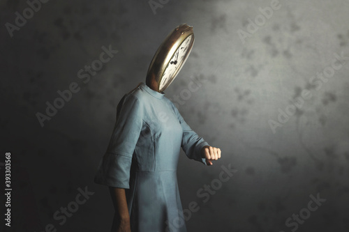 Photography surreal woman with clock in place of face checks time pass
