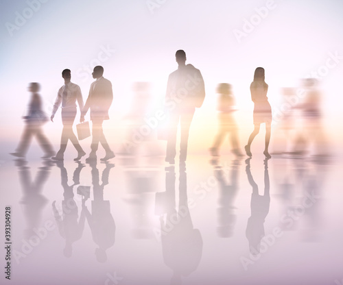 Blurry motion of business people walking in a city