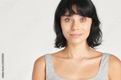 Beautiful woman in a gray top