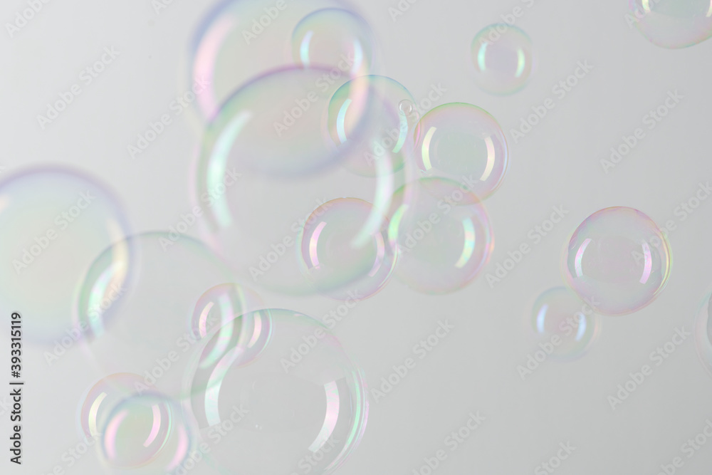 Transparent soap bubble pattern on a gray background wallpaper