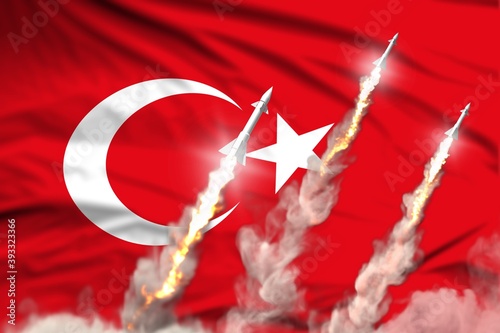 Turkey ballistic warhead launch - modern strategic nuclear rocket weapons concept on flag fabric background, military industrial 3D illustration with flag photo