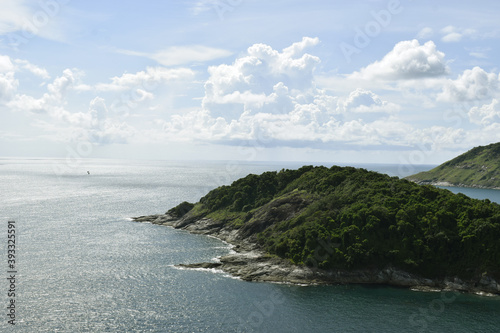 A sea landscape with an island full of small trees