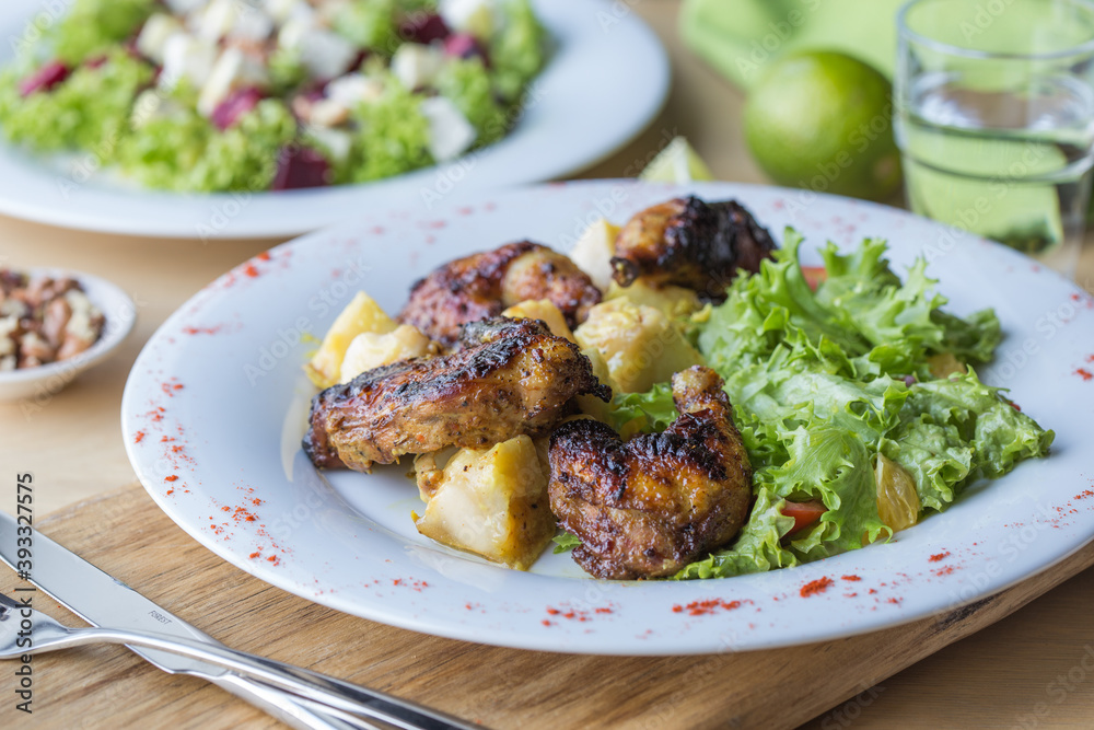 Grilled or roasted spicy chicken wings with bbq sauce Grilled or roasted spicy chicken wings with bbq sauce