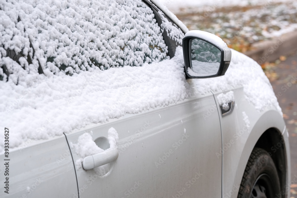 Obraz premium White passenger car is parked