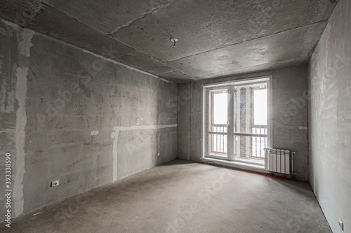 Russia, Moscow- April 17, 2020: interior room apartment rough repair for self-finishing. interior decoration, bare walls of the premises, stage of construction