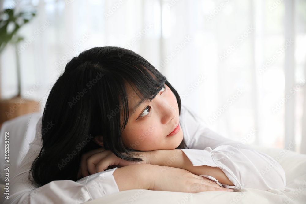 Portrait beautiful asian girl sleeping on bed in white room Portrait beautiful asian girl sleeping on bed in white room