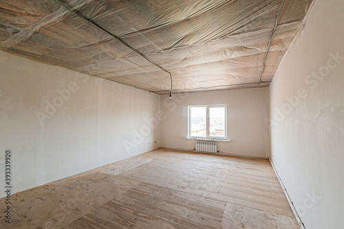 Russia, Moscow- April 17, 2020: interior room apartment rough repair for self-finishing. interior decoration, bare walls of the premises, stage of construction