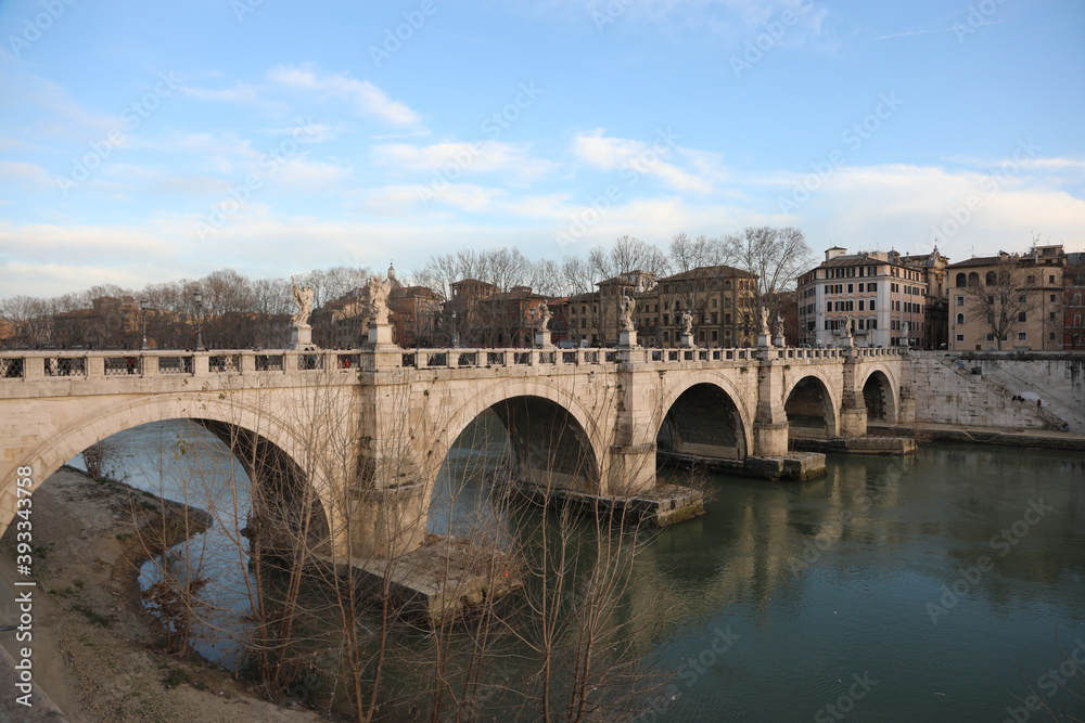 ancient Roman Bridge in the city of Rome and the Tiber River