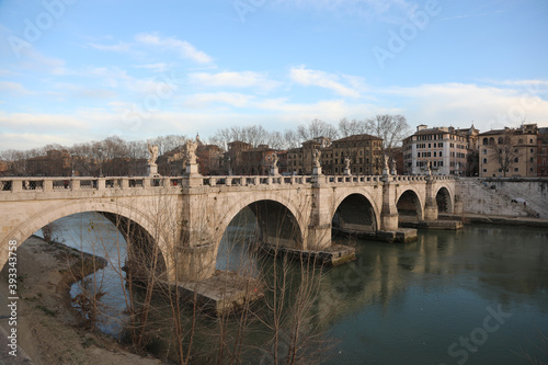 ancient Roman Bridge in the city of Rome and the Tiber River
