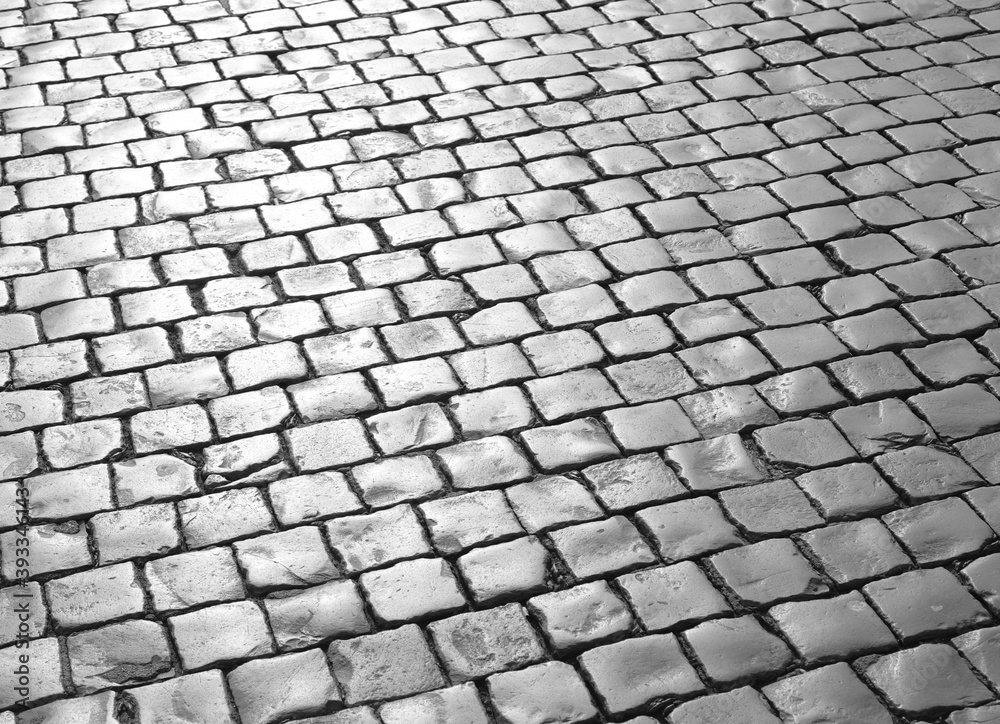 background of the pavement called cobblestones or Sampietrini in