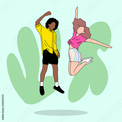 Two friends of different ethnicities jumping against the wall. They are having fun.