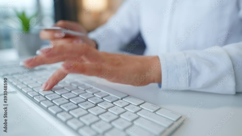 Female hands typing credit card number on computer keyboard. Woman making online purchase. Online payment service. Female hands typing credit card number on computer keyboard. Woman making online purchase. Online payment service.