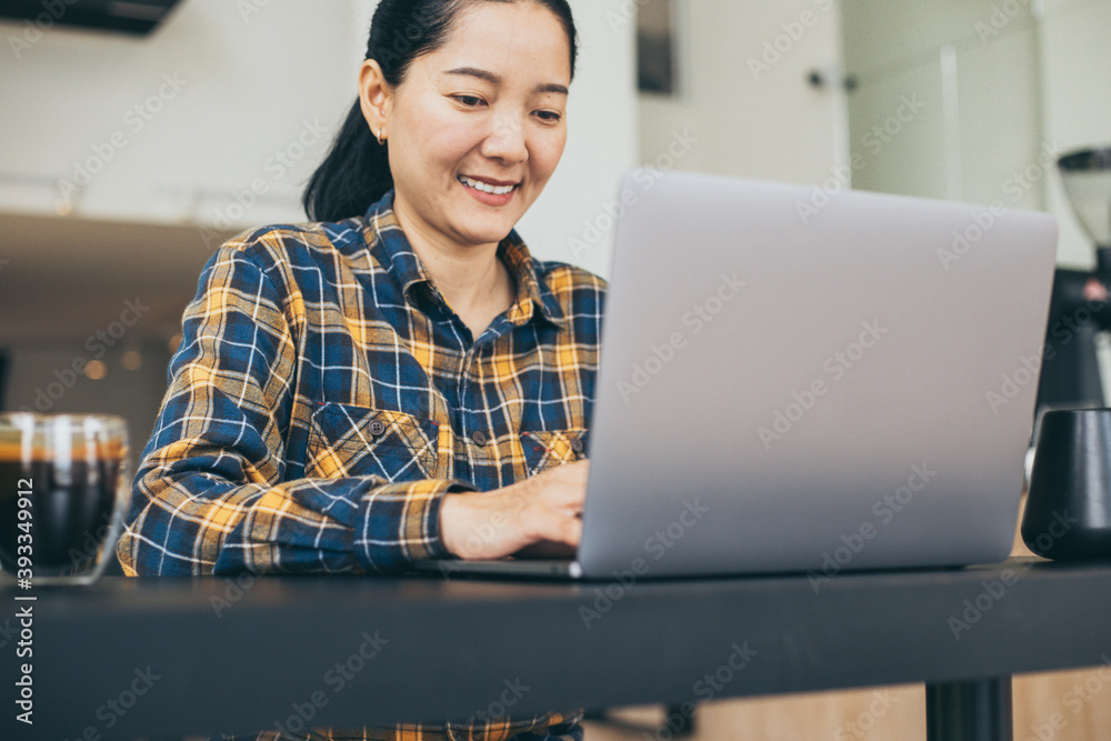 contact us.using computer.woman hand typing keyboard laptop work online chatting search form internet sitting at office.concept for technology device communication business people