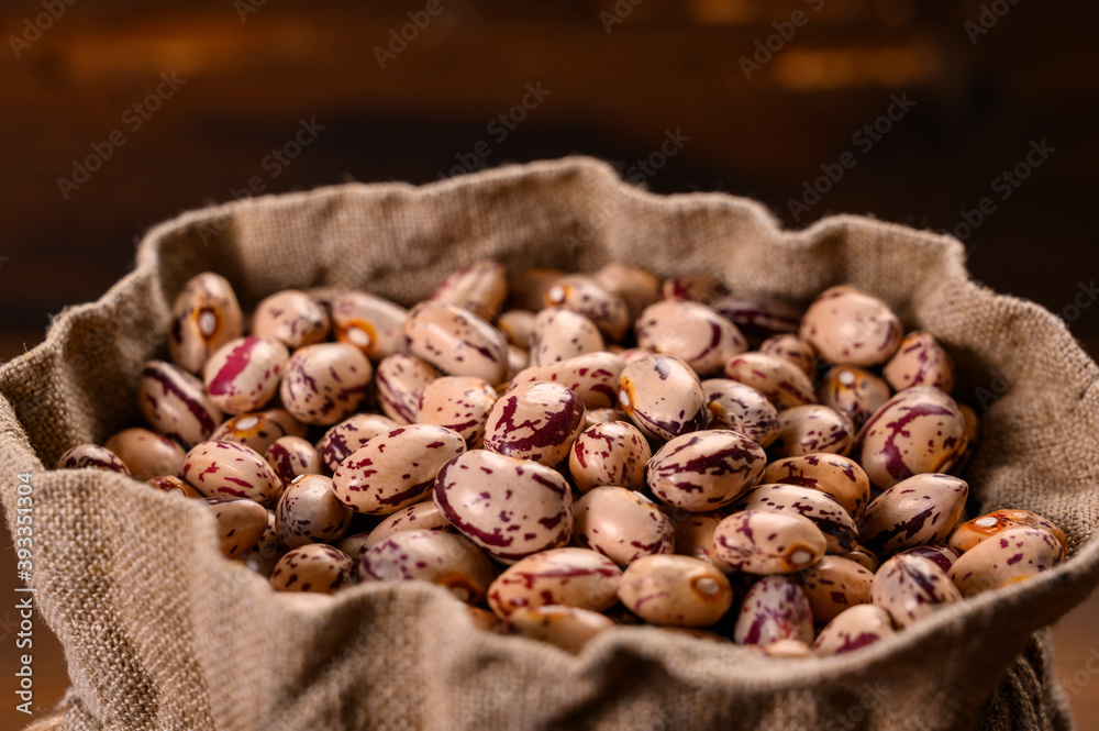 Colored beans on wooden background. Colored beans on wooden background.