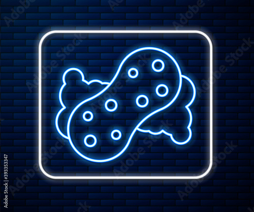 Glowing neon line Sponge with bubbles icon isolated on brick wall background. Wisp of bast for washing dishes. Cleaning service logo. Vector.