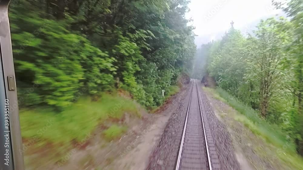 Timelapse Of Train In Motion View From Rear Window. Follow Shot Amtrak Washington state next to river Timelapse Of Train In Motion View From Rear Window. Follow Shot Amtrak Washington state next to river