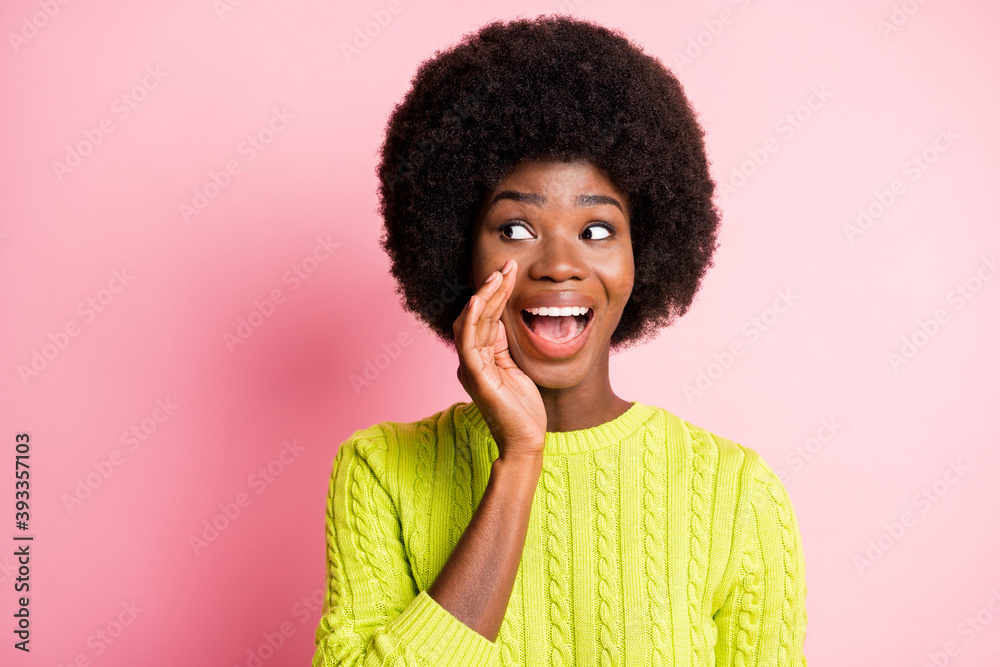 Photo portrait of girl announcing looking at blank space isolated on pastel pink colored background