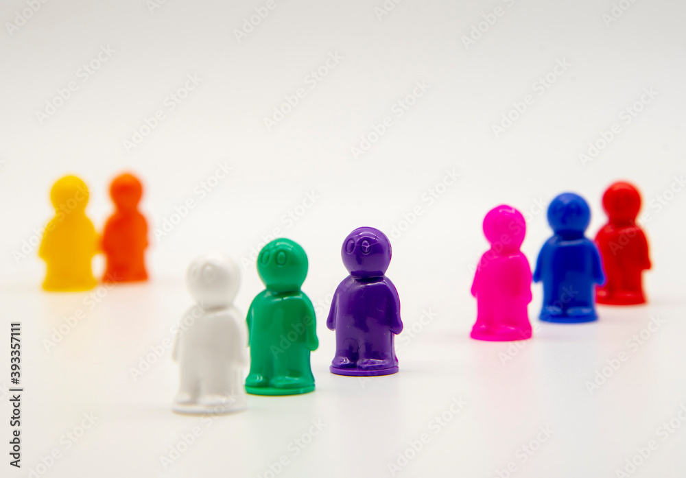 Small plastic men on a white background. Small plastic men on a white background.
