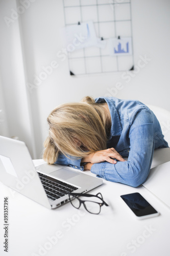 Over-worked stressed businesswoman