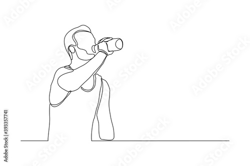 Continuous line drawing of sporty man drink energy water from bottle. One line art concept of healthy life style. Vector illustration