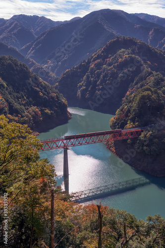 Railway bridge across the bended river in Shizuoka Japan photo