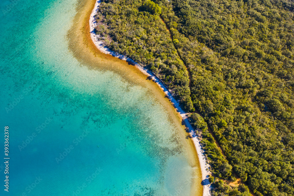 Obraz premium Aerial view of long hidden beaches and emerald sea surface. Adriatic coastline in Croatia, Dugi otok island.