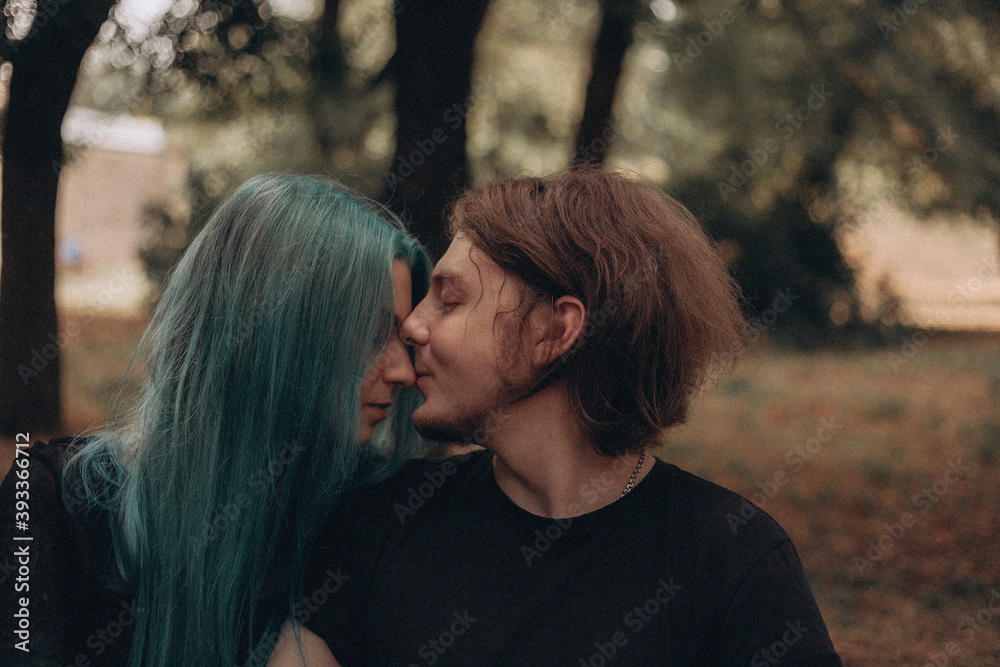 Fototapeta premium young couple walking in the park