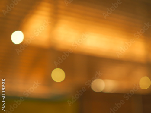 Evening sun In contact with the wall Shadows, Glittering golden light and bokeh Little, abstract  background.