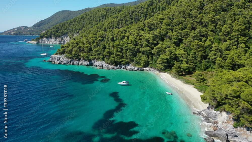 Aerial drone video of breathtaking secluded turquoise beaches of Ftelia and Megalo Pefko in island of Skopelos, Sporades, Greece Aerial drone video of breathtaking secluded turquoise beaches of Ftelia and Megalo Pefko in island of Skopelos, Sporades, Greece