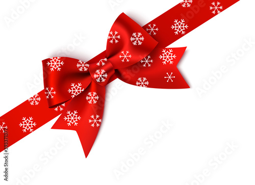 Decorative red bow with diagonally red ribbon. New Year and Christmas decoration. Vector bow with snowflakes isolated on white