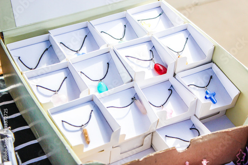 Rows of necklaces in boxes photo