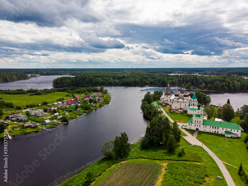 July, 2020 - Anthony-Siya monastery. Russian monastery on a peninsula in the middle of a lake. Beautiful landscape with temples. Russia, Arkhangelsk region